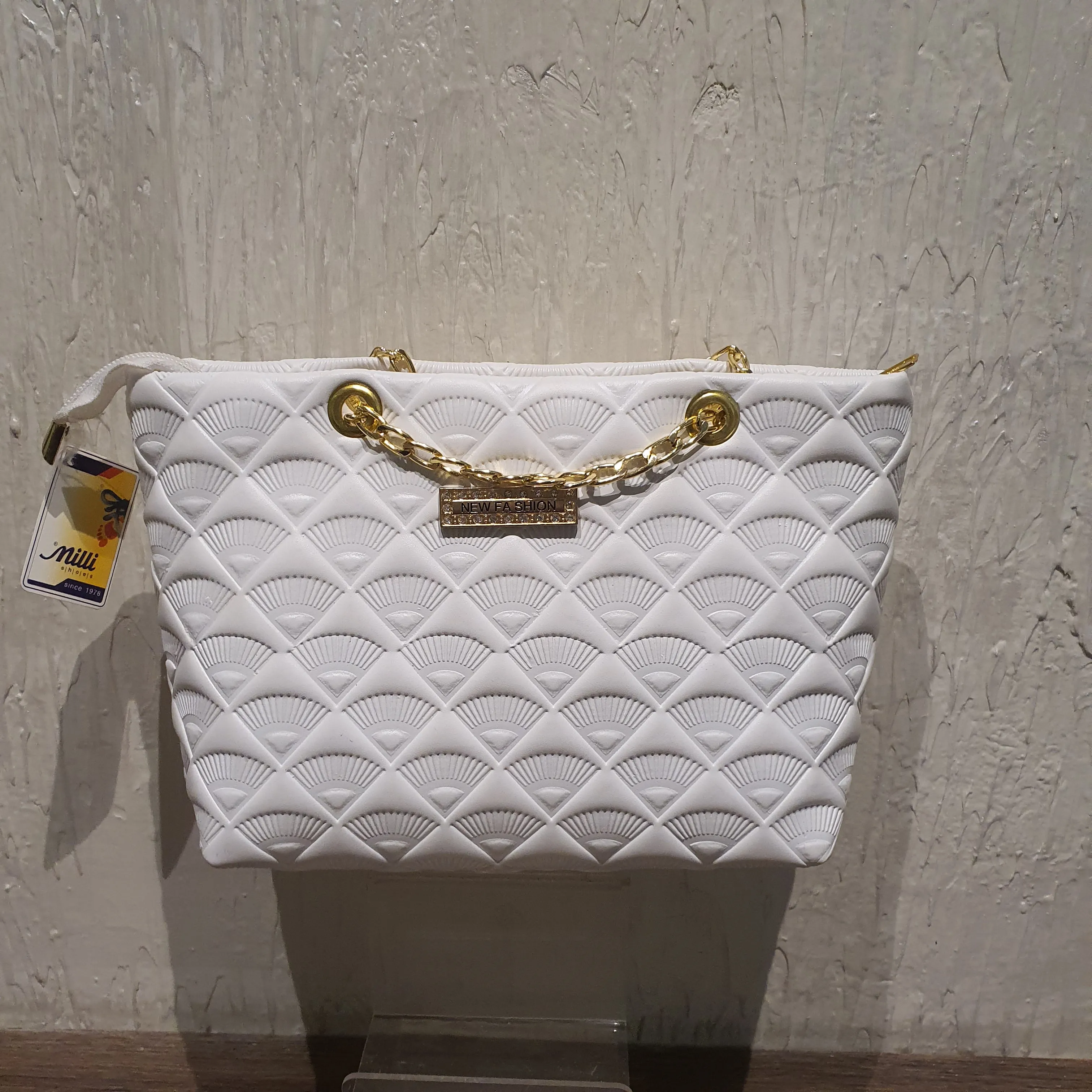 White fancy handbag